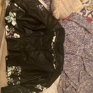 This is a Steve Madden floral leather jacket xL in size